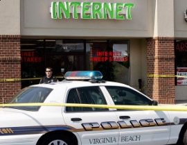 Police raided about a dozen sweepstakes cafes throughout Virginia Beach, including this one at Timberlake Shopping Center on Holland Road on Wednesday, Sept. 22, 2010. They seized 400 to 500 computers used in suspected illegal gambling. <span class='credit'>(David B. Hollingsworth | The Virginian-Pilot)</span>